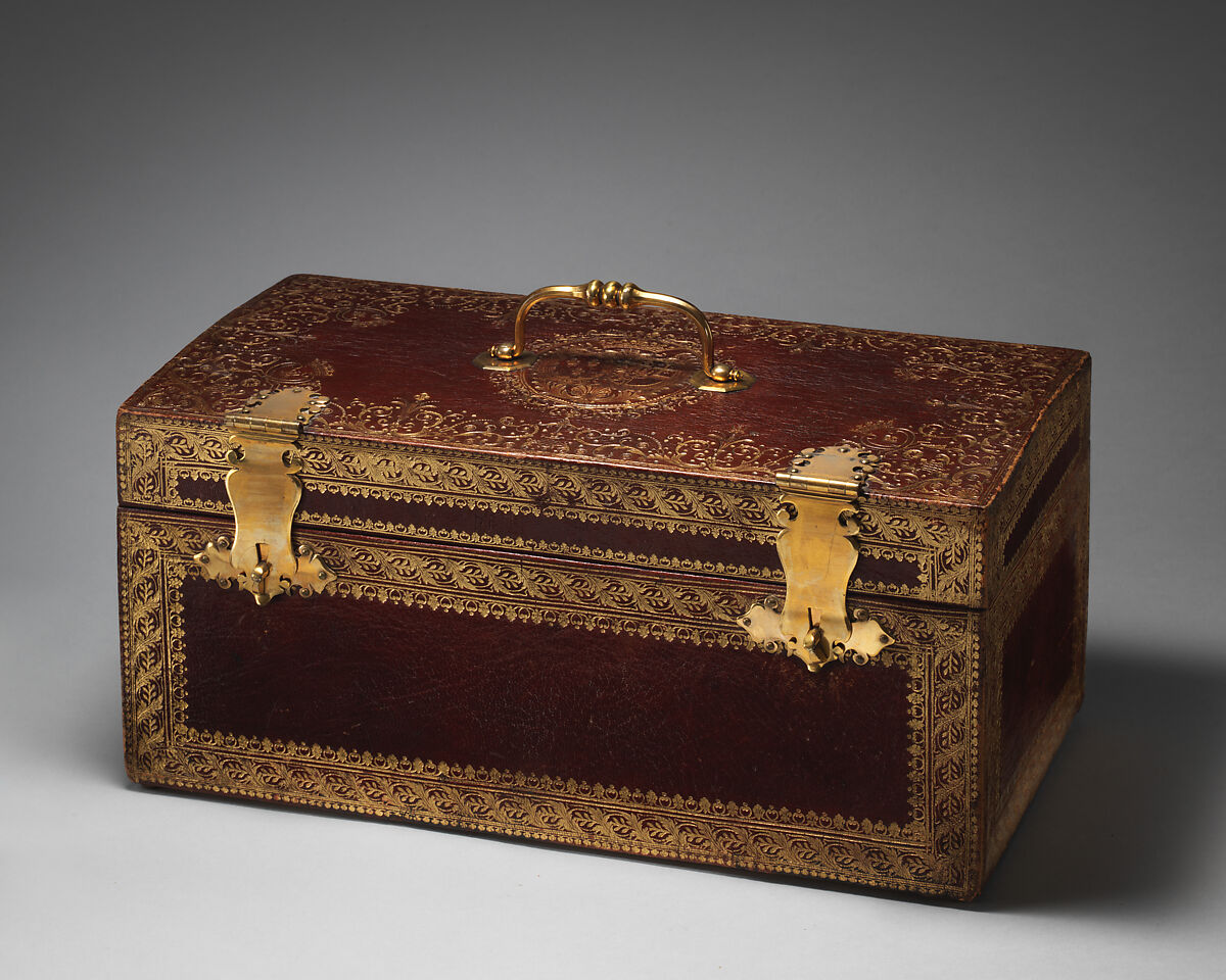 Coffer stamped with the arms of Marie Thérèse of Savoy as the Countess of Artois, attributed to les frères Riollant (French), Wood, red morocco gilt-tooled leather, brass metal handle and clasps; silk lining, French 