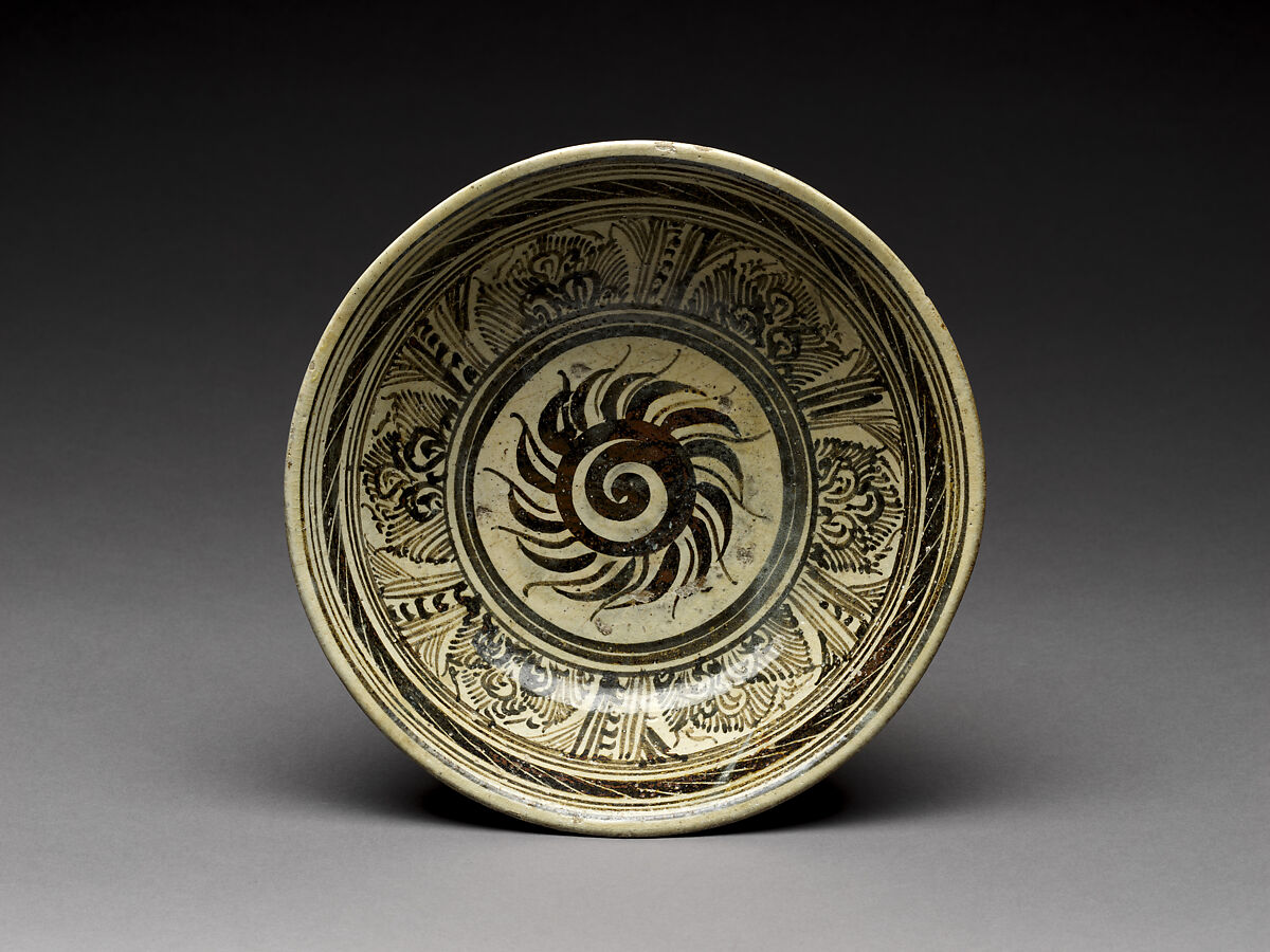 Bowl with flaming solar disk design, Stoneware with iron-brown underglaze décor, North-central Thailand, Sukhothai kilns 