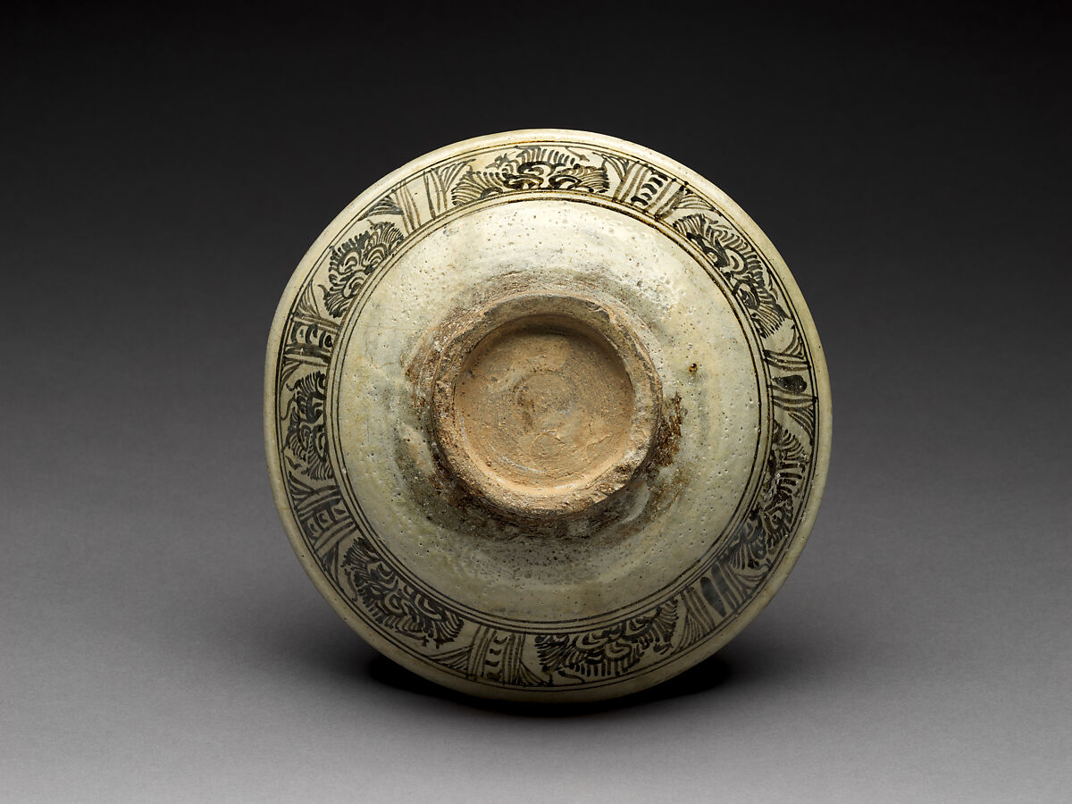 Bowl with flaming solar disk design, Stoneware with iron-brown underglaze décor, North-central Thailand, Sukhothai kilns