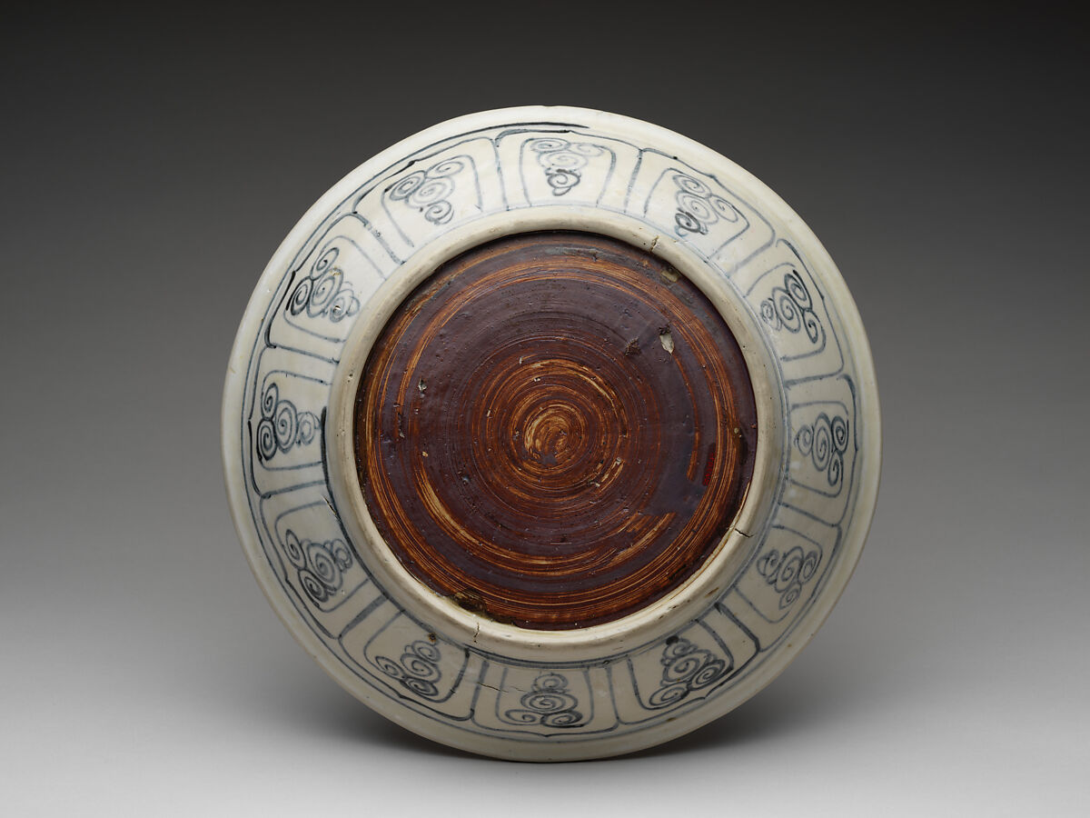 Dish with bird amid  bamboo design and foliate meander on cavetto, Stoneware painted with cobalt blue under a transparent glaze, Vietnam, probably Hai D’uong Province