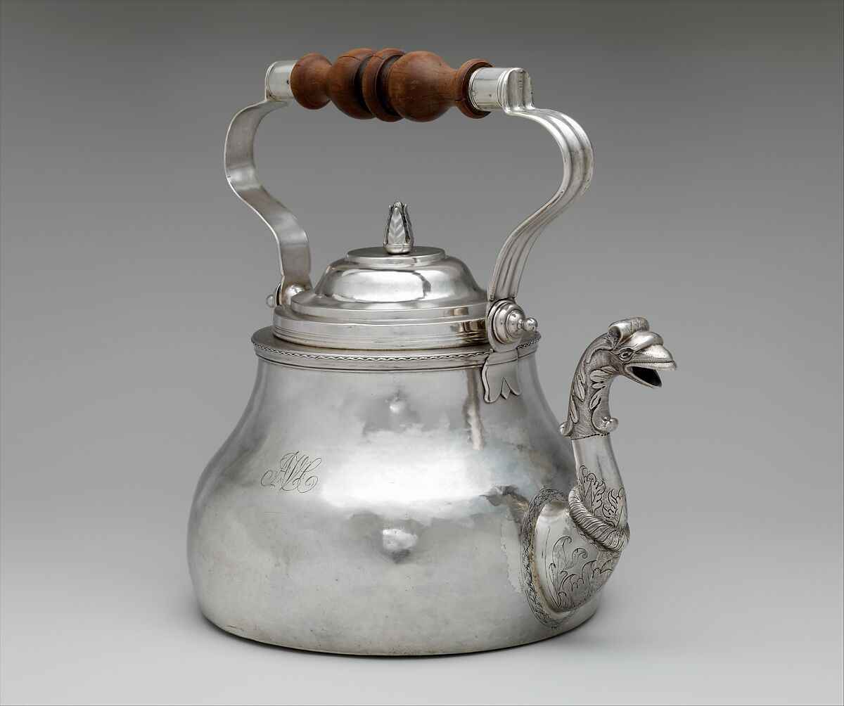 tea kettle with bird on spout