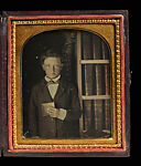 [Boy in a Library, Holding a Daguerreotype], Unknown (American), Daguerreotype with applied color