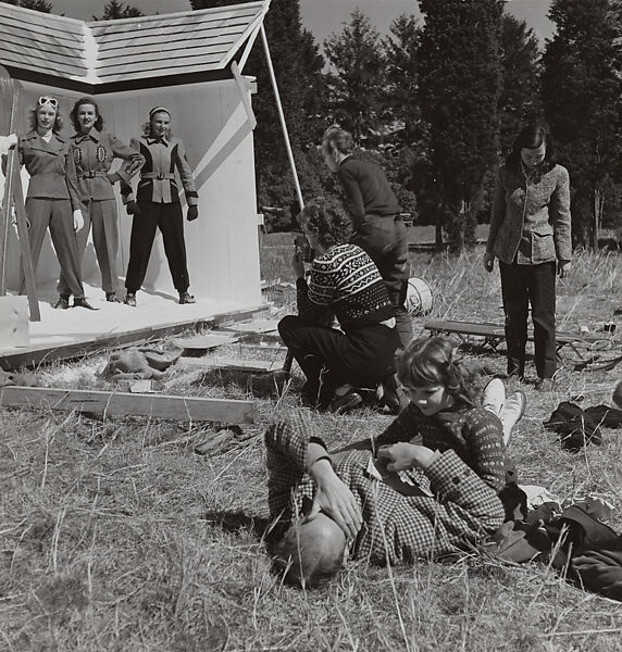Toni Frissell Photographing Three Models at a Fashion Shoot with Her Husband and Daughter in the Foreground, Frances McLaughlin-Gill (American, 1919–2014), gelatin silver print 