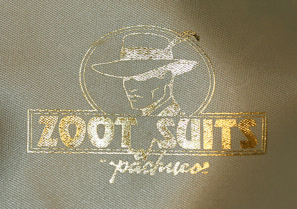Zoot suit, (c) cotton; (d) silk; (f) leather, metal (g) elastic, leather, metal; (h) wool; (i, j) leather, American