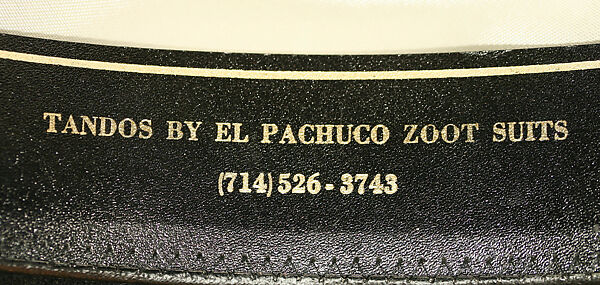 Zoot suit, (c) cotton; (d) silk; (f) leather, metal (g) elastic, leather, metal; (h) wool; (i, j) leather, American