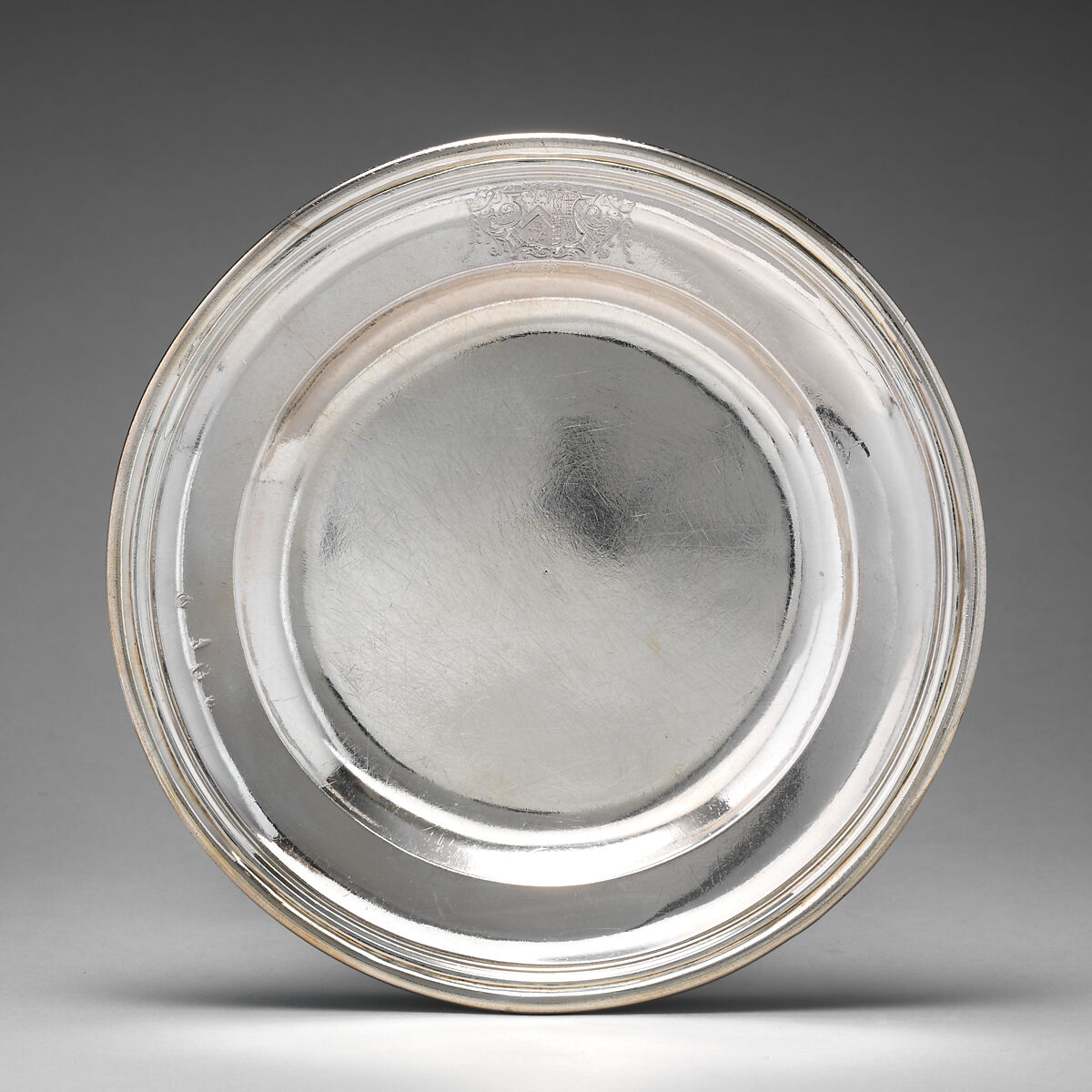 Dinner plate with English arms (one of a group of four), Richard Bayley (British, active 1708–48), Silver, British, London 