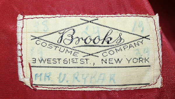 Fancy dress costume, Brooks Costume Company (American), (a) acetate, rayon, nylon
(b,c) silk
(d) rayon
(e, f) cotton
(i) rayon
(j) plastic, American
