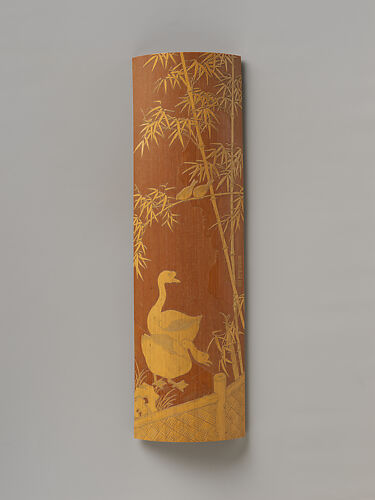 Wrist rest decorated with geese, sparrows, bamboo, and rock