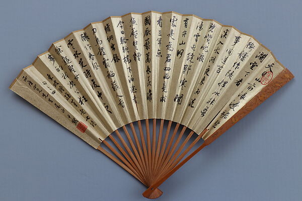 Carved fan, calligraphy, Bamboo frame carving by Jin Xiya (Chinese, 1890–1979), Folding fan; ink on gold-flecked paper with carved bamboo frame, China 