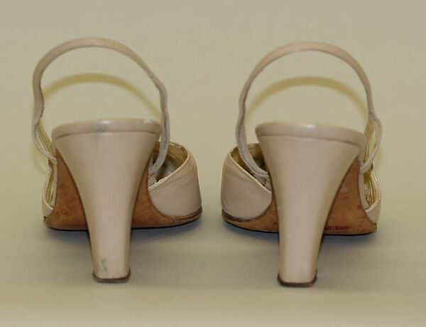 Evening ensemble, (a–c) House of Chanel (French, founded 1910), (a) wool, cotton; (b) gilt metal, rhinestones, faux pearls; (c) silk; (d, e) leather, silk, French