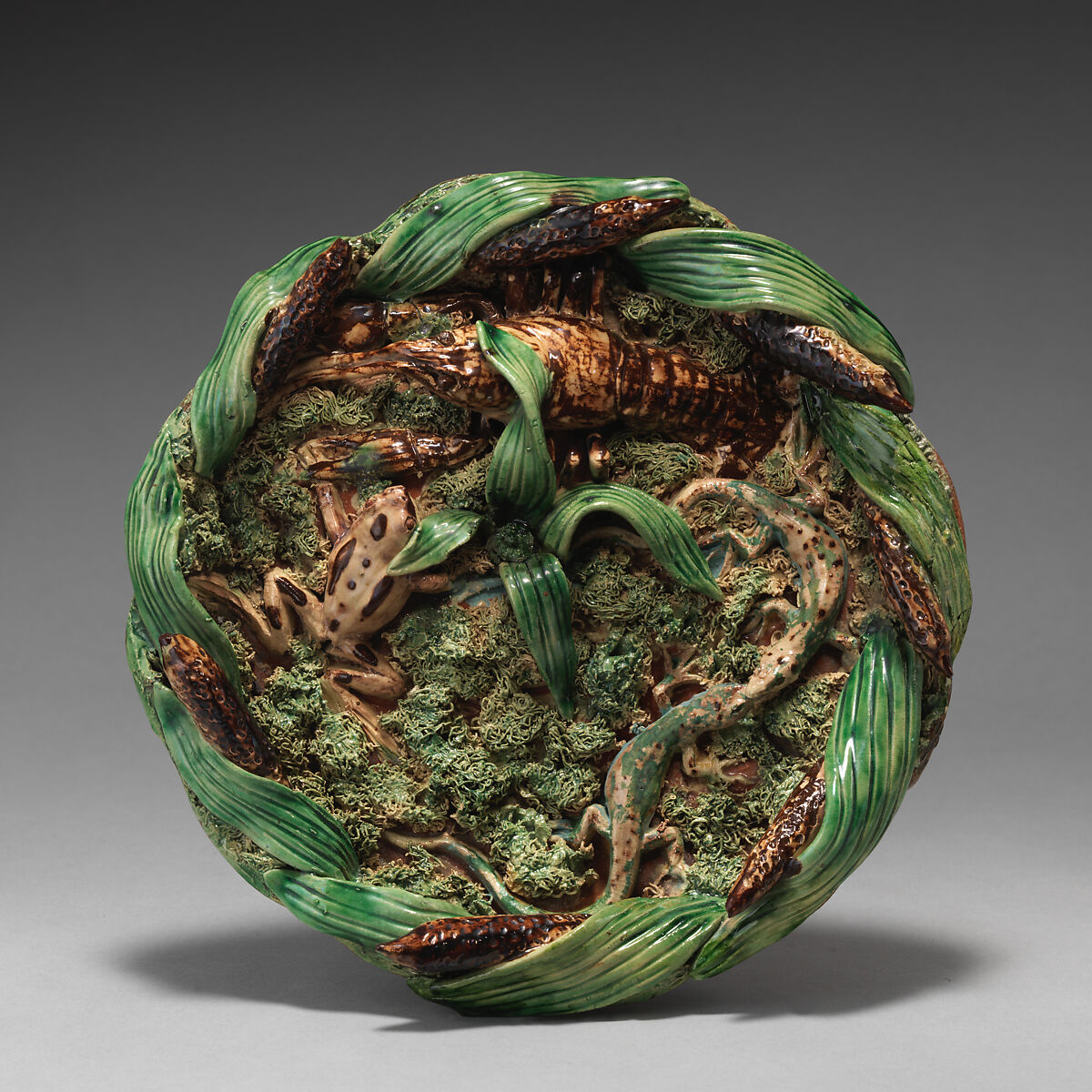 Round dish with cattail border, Emile Gambut (French, active in Chalon-sur-Saône.), Glazed terracotta, French, Beaune 