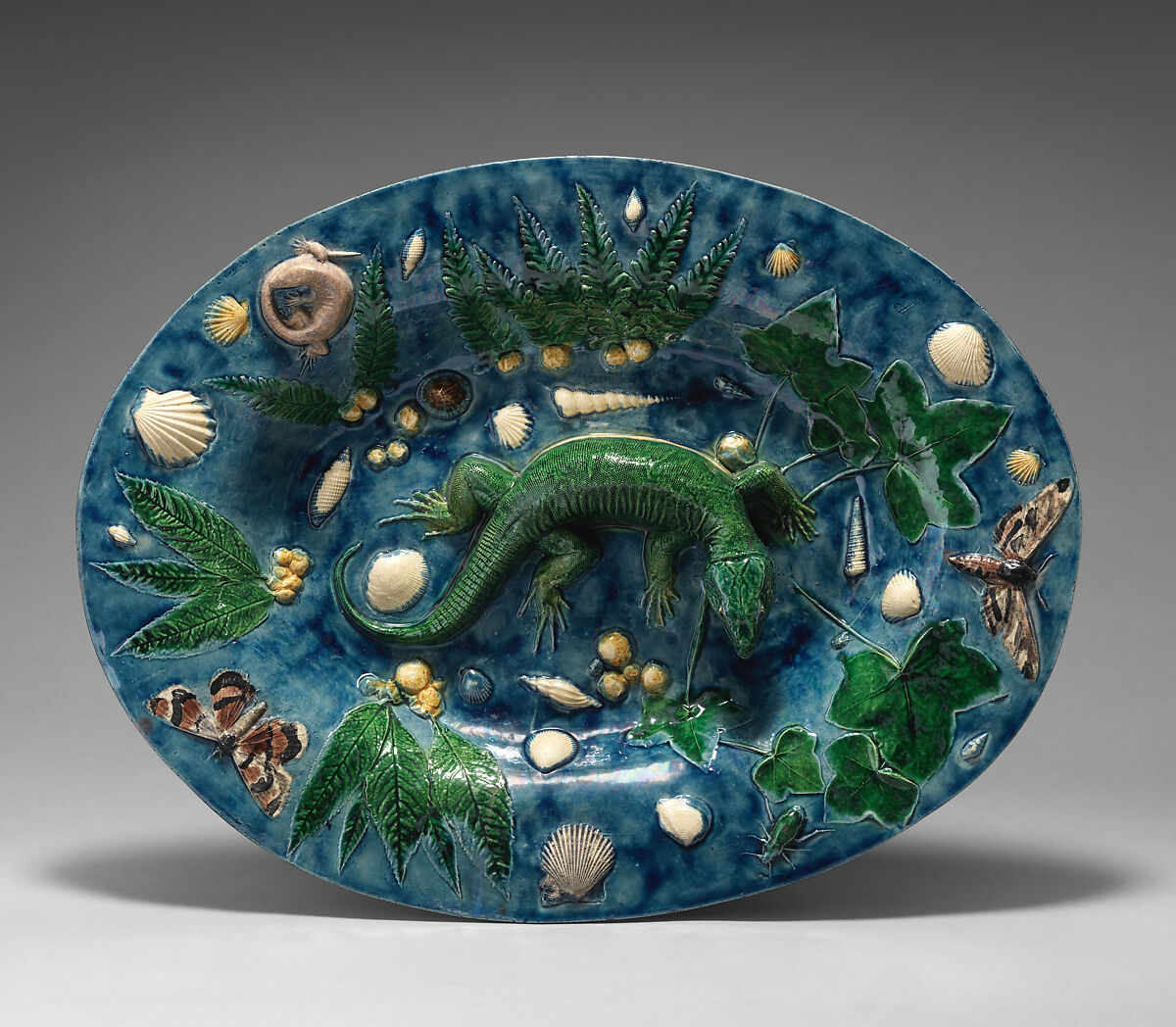 Oval basin with lizard, shells, and light blue background, Georges Pull (Wissembourg, Alsace-Lorraine, France 1810–1889 Paris, France), Glazed earthenware , French, Paris 