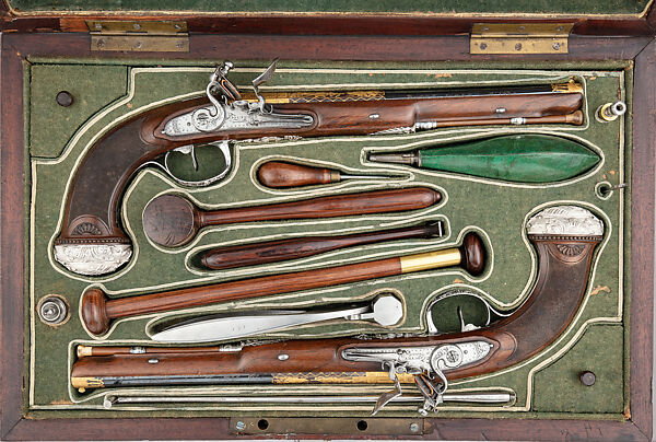 Cased pair of flintlock pistols with accessories Boutet