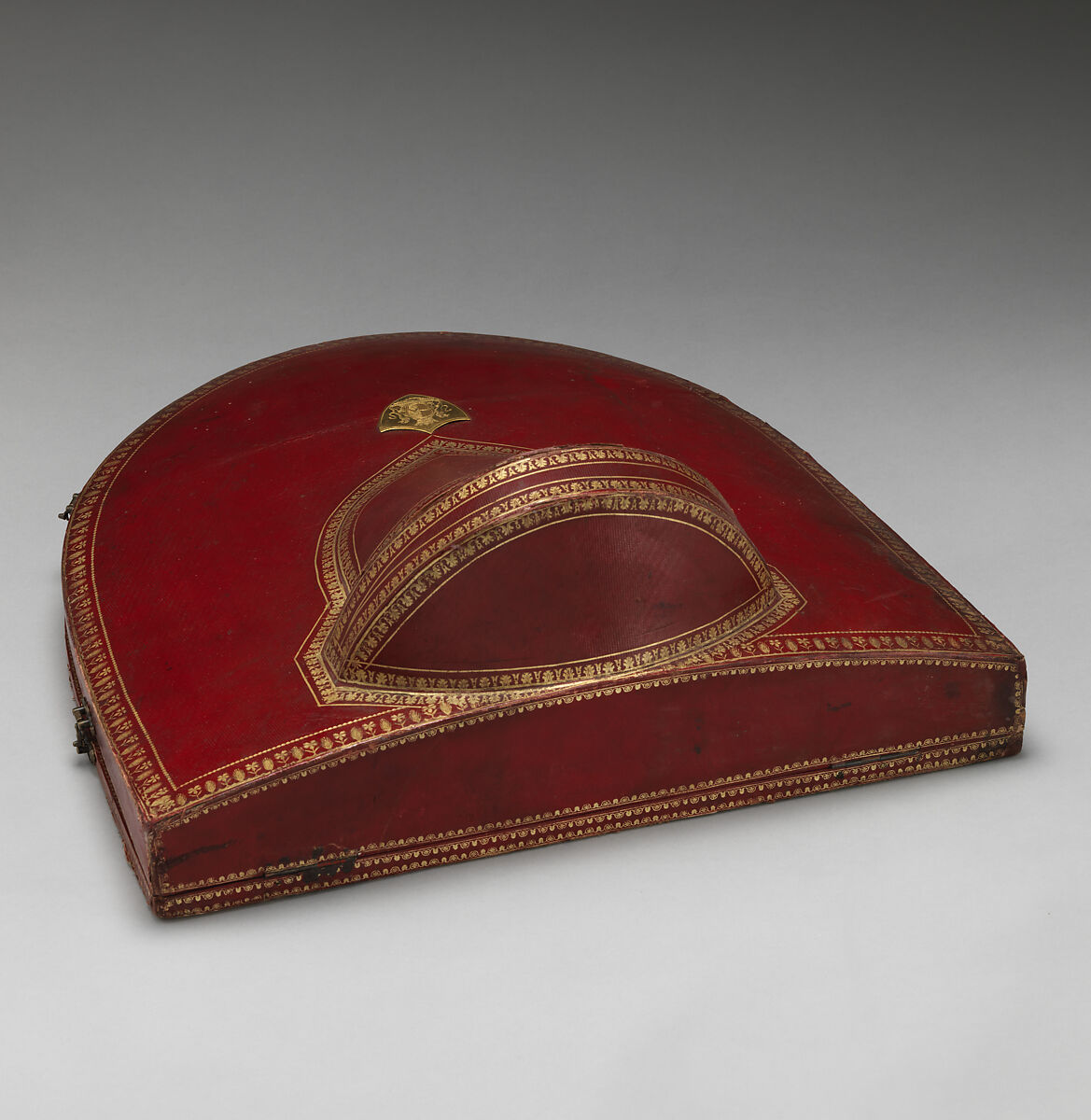 Fifteen-piece parure in leather case, Cut steel; red moroccan leather, gilt stamped, French