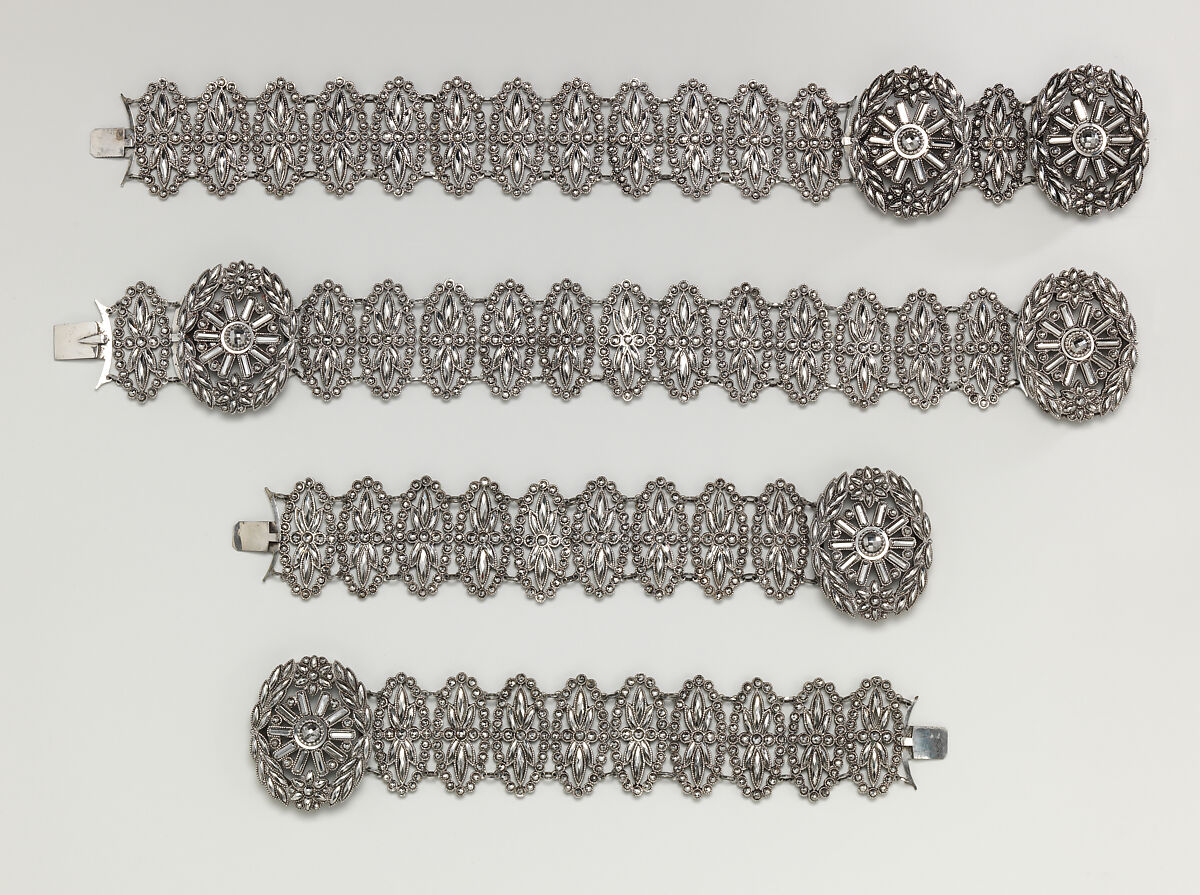 Fifteen-piece parure in leather case, Cut steel; red moroccan leather, gilt stamped, French