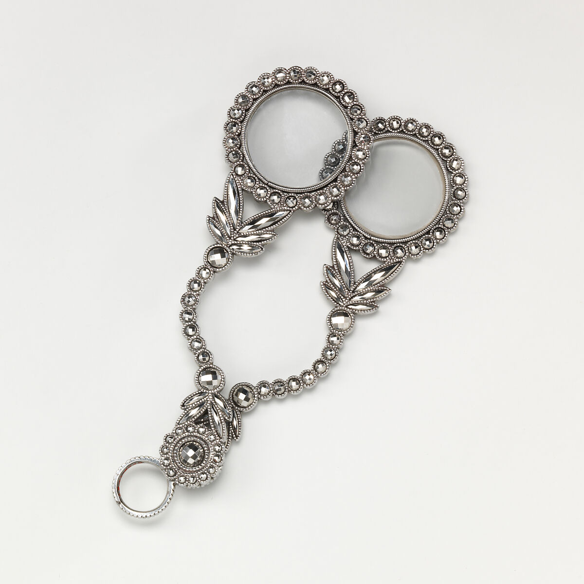 Fifteen-piece parure in leather case, Cut steel; red moroccan leather, gilt stamped, French