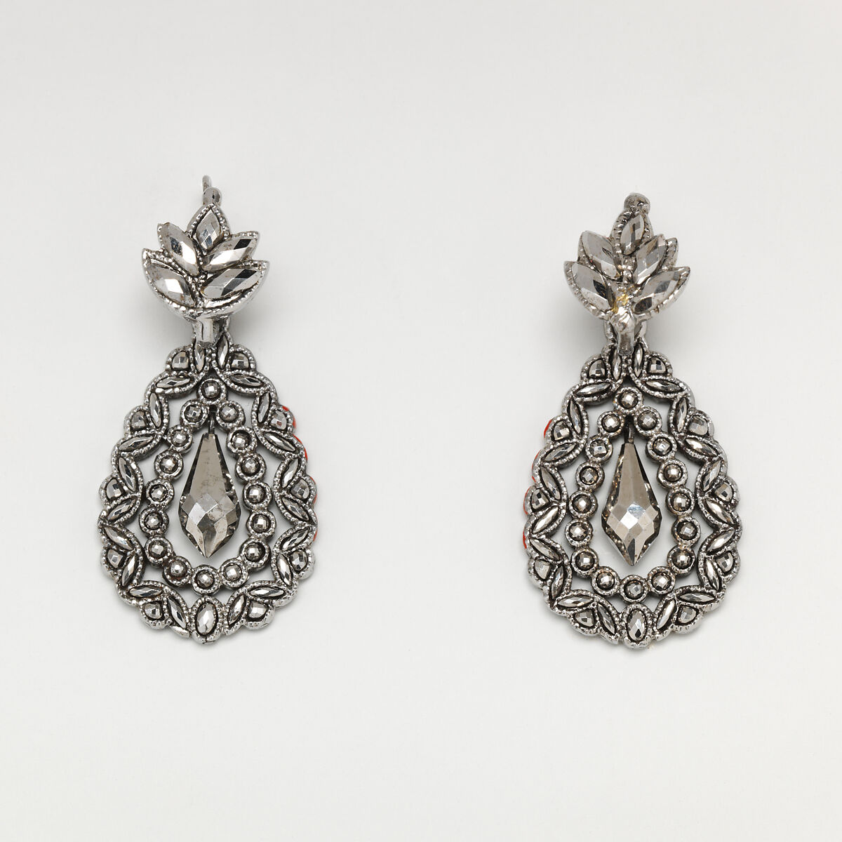 Fifteen-piece parure in leather case, Cut steel; red moroccan leather, gilt stamped, French