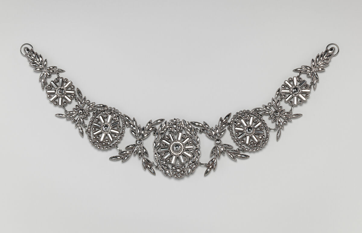 Fifteen-piece parure in leather case, Cut steel; red moroccan leather, gilt stamped, French