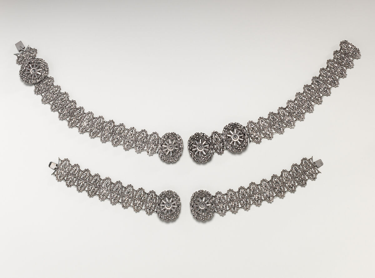 Fifteen-piece parure in leather case, Cut steel; red moroccan leather, gilt stamped, French