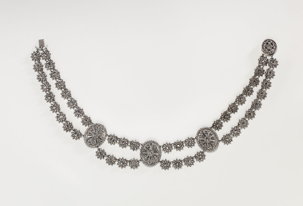 Fifteen-piece parure in leather case, Cut steel; red moroccan leather, gilt stamped, French