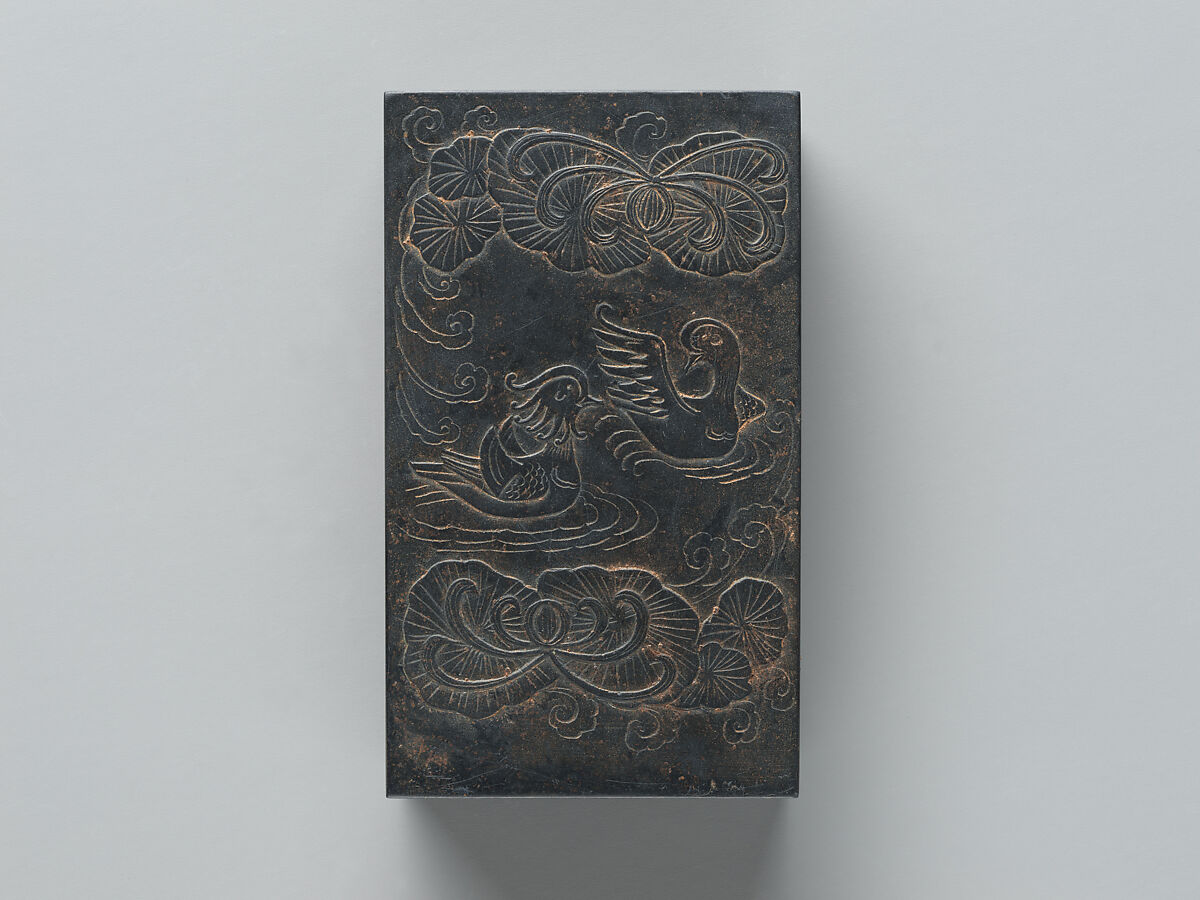 Inkstone and cover with mandarin ducks in a lotus pond, She stone, China
