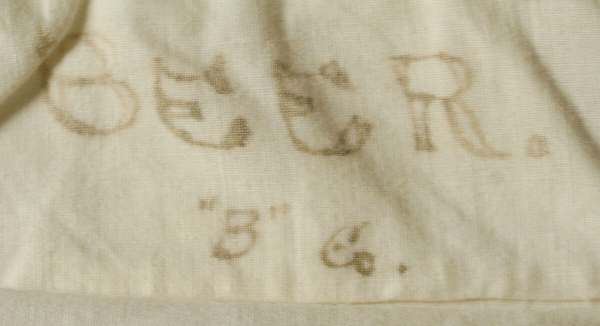 Military uniform, (a) wool
(b) cotton, American