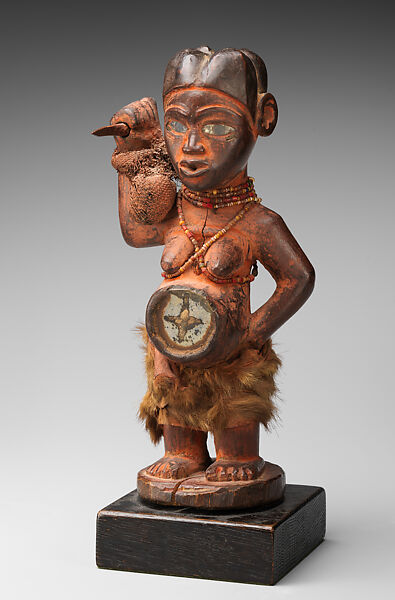 Female nkisi (power figure), Kongo artist and nganga (ritual specialist), Wood, resin, glass, pigment, cloth, fur, string, Kongo peoples