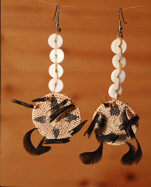 One-rod coiled basket earrings, Clint McKay  Dry Creek Pomo/Wappo/Wintun (Sonoma County, California), Willow shoot foundation, sedge root weft, dyed bulrush root weft, feathers (California valley quail topknots), clamshell, sinew, and metal, Dry Creek Pomo/Wappo/Wintun (Sonoma County, California)