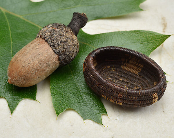 Miniature three-rod coiled negative boat basket, Willow shoot foundation, sedge root weft, and dyed bulrush root weft, Pomo (Northern California) 