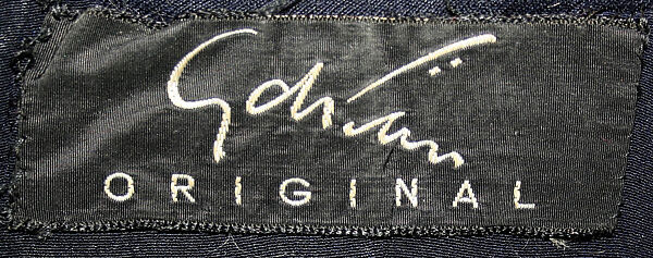 Suit, Gilbert Adrian (American, Naugatuck, Connecticut 1903–1959 Hollywood, California), (a) wool, silk, rayon, metal; (b) wool, American