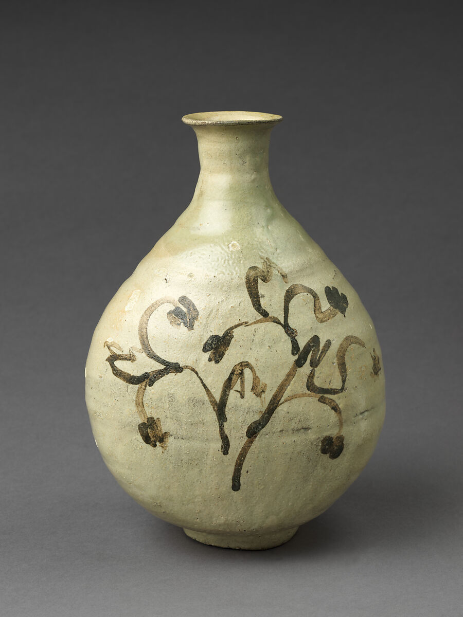 Bottle decorated with flowering plant, Buncheong ware with white slip and iron-brown, Korea 