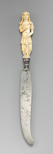 Knife with carved handle in the form of Apollo