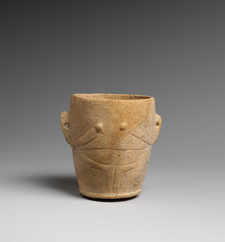 Marble vase with lug handles