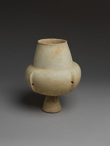 Marble vase with high foot and lug handles