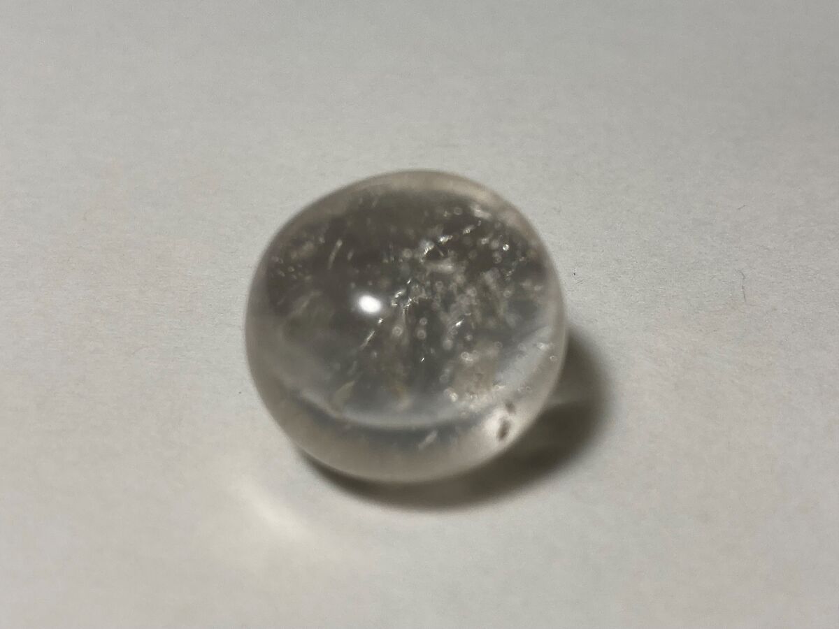 Game piece, Stone, rock crystal? 