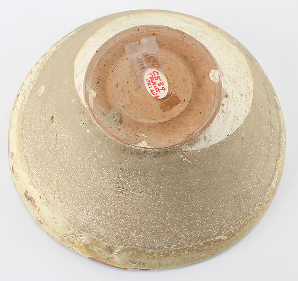 Bowl with Epigraphic Band in Kufic, Earthenware; white slip with dark-brown, olive, and reddish-orange slip decoration, incised, under transparent colorless glaze