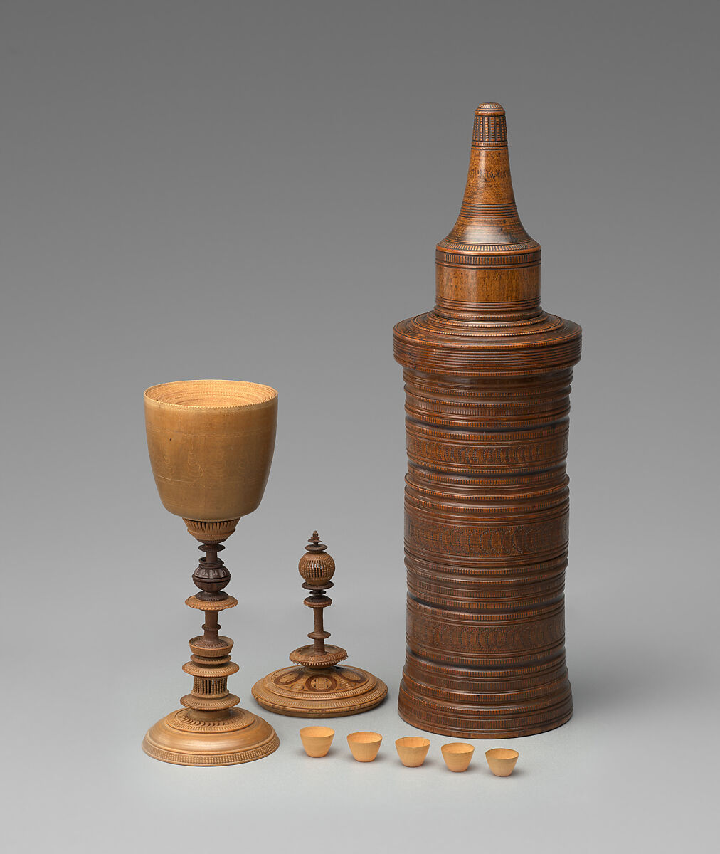 Turned cup and cover with inserts and original case, Unidentified turner, Berchtesgaden, Turned, carved, and stippled maple and plum, partly stained, German, Berchtesgaden