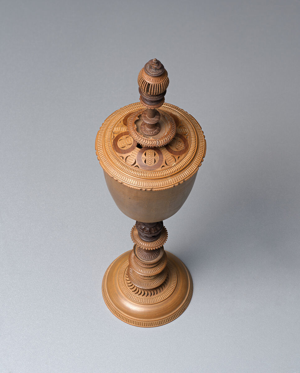 Turned cup and cover with inserts and original case, Unidentified turner, Berchtesgaden, Turned, carved, and stippled maple and plum, partly stained, German, Berchtesgaden