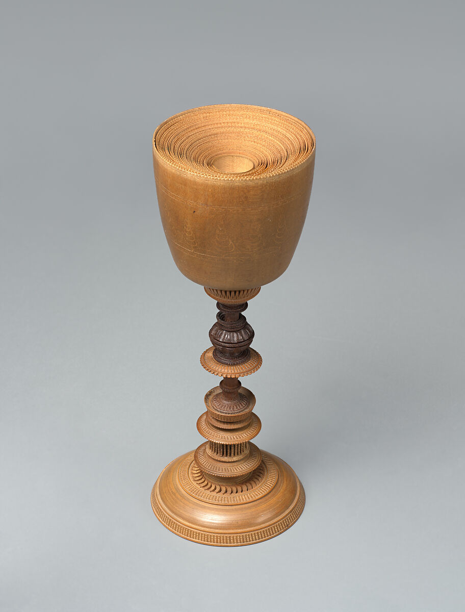 Turned cup and cover with inserts and original case, Unidentified turner, Berchtesgaden, Turned, carved, and stippled maple and plum, partly stained, German, Berchtesgaden