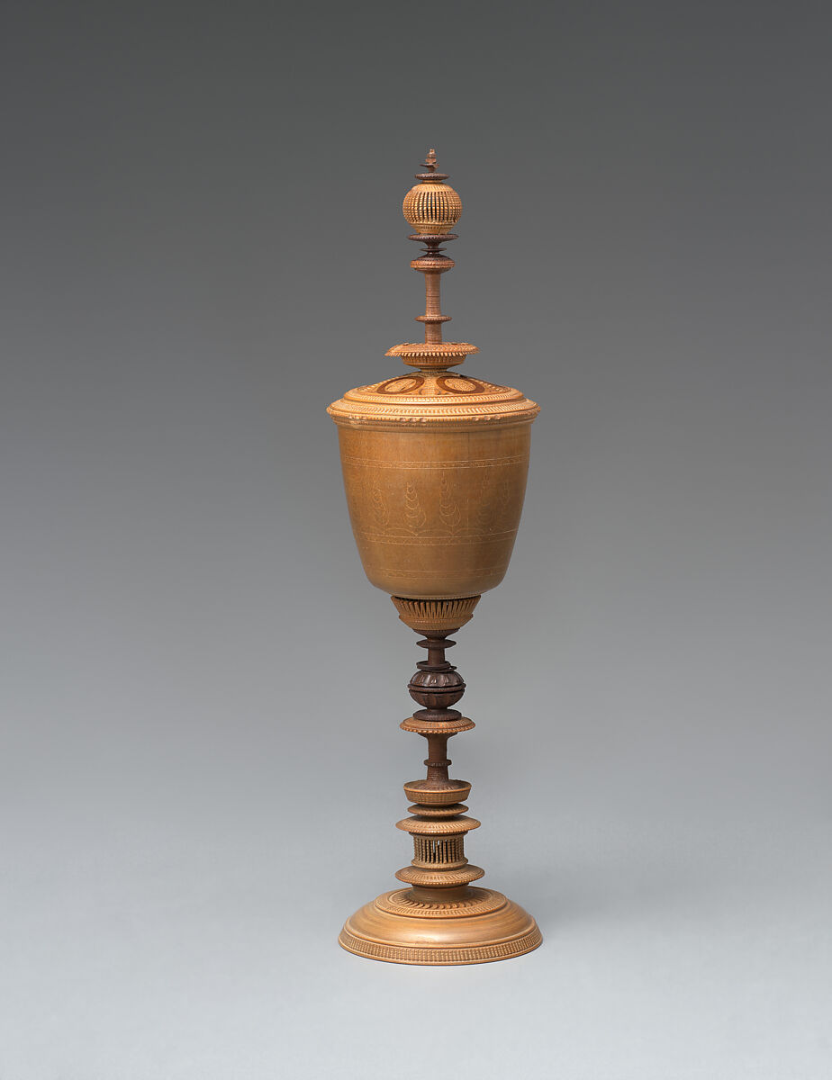 Turned cup and cover with inserts and original case, Unidentified turner, Berchtesgaden, Turned, carved, and stippled maple and plum, partly stained, German, Berchtesgaden