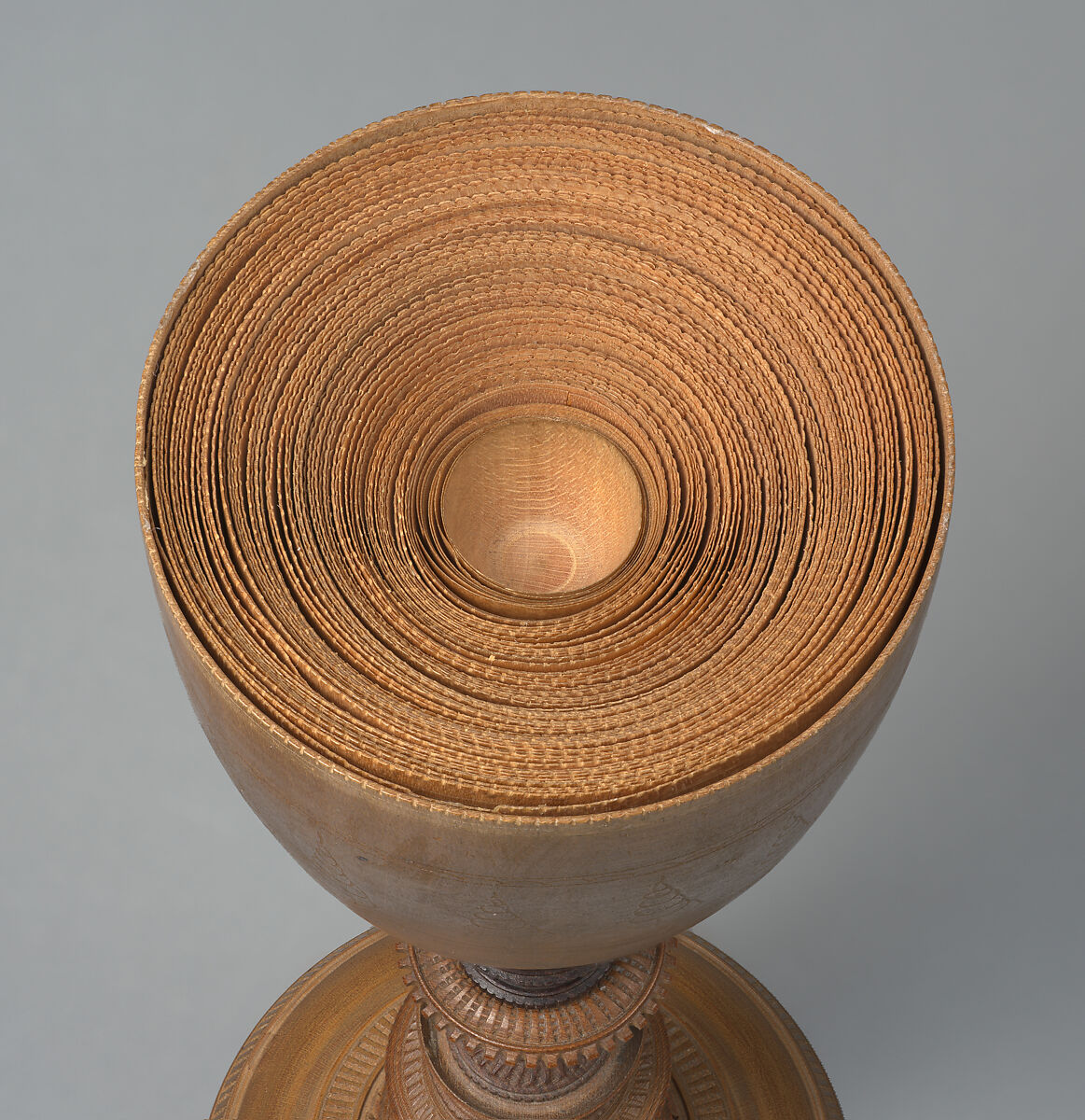 Turned cup and cover with inserts and original case, Unidentified turner, Berchtesgaden, Turned, carved, and stippled maple and plum, partly stained, German, Berchtesgaden