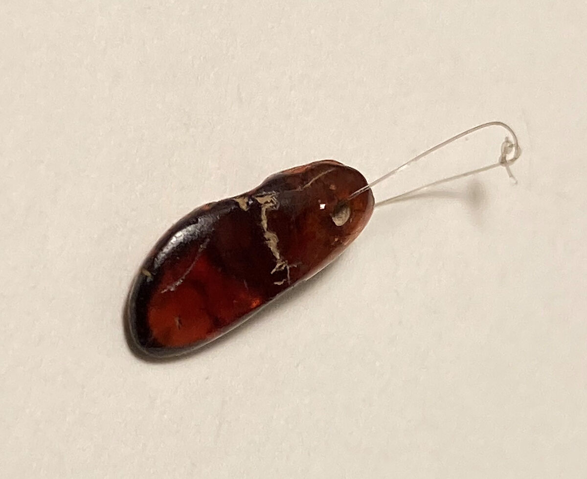 Drilled Stone, Garnet?