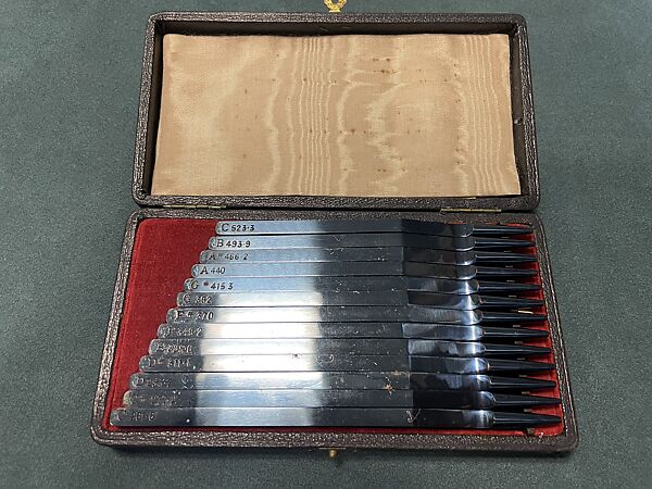 Boxed set of 12 chromatic tuning forks, RAGG Tuning Forks (United Kingdom), Blue metal and velvet-lined case, United Kingdom