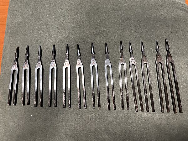 Boxed set of 12 chromatic tuning forks, RAGG Tuning Forks (United Kingdom), Blue metal and velvet-lined case, United Kingdom