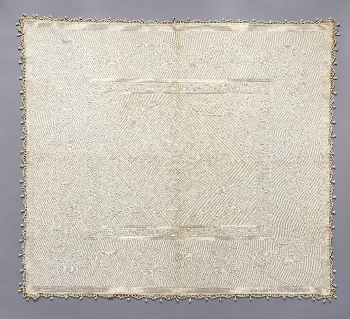 Stuffed quilt, Cotton: stuffed "whitework", probably English or Spanish