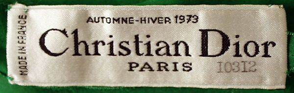 Evening ensemble, (a–c) House of Dior (French, founded 1946), a,b) silk, metallic thread
c) feathers
d,e) leather, French