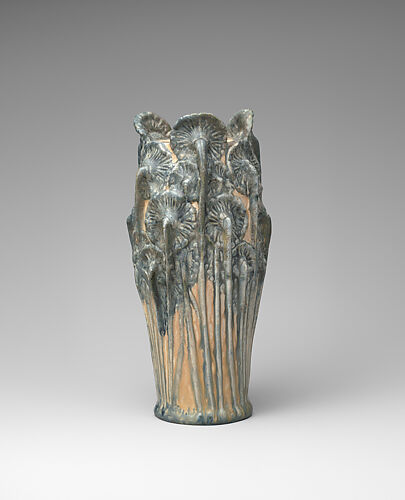 Vase with flowering plants