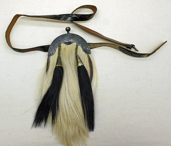 Ensemble, L.P. Hollander &amp; Co. (American), (a) silk
(b) wool, silk, leather
(c) wool
(d) silk, metal, feather
(e) metal, leather, hair, American