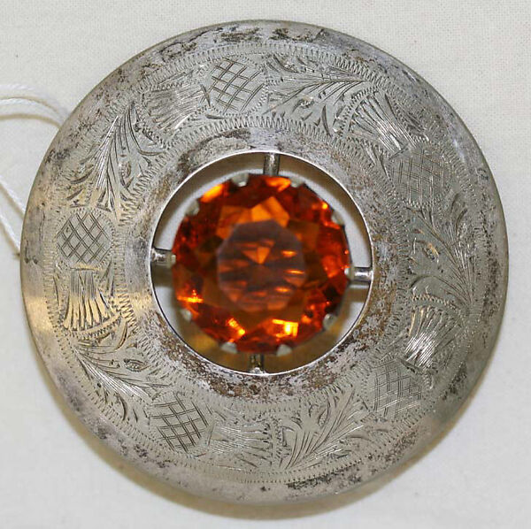 Ensemble, (a) silk, metal
(b) wool, cotton
(c, g) silk
(d, e, i, j) wool
(f) silk
(h) leather, metal, hair
(k, l) metal, glass, Scottish