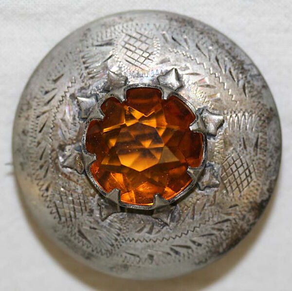 Ensemble, (a) silk, metal
(b) wool, cotton
(c, g) silk
(d, e, i, j) wool
(f) silk
(h) leather, metal, hair
(k, l) metal, glass, Scottish